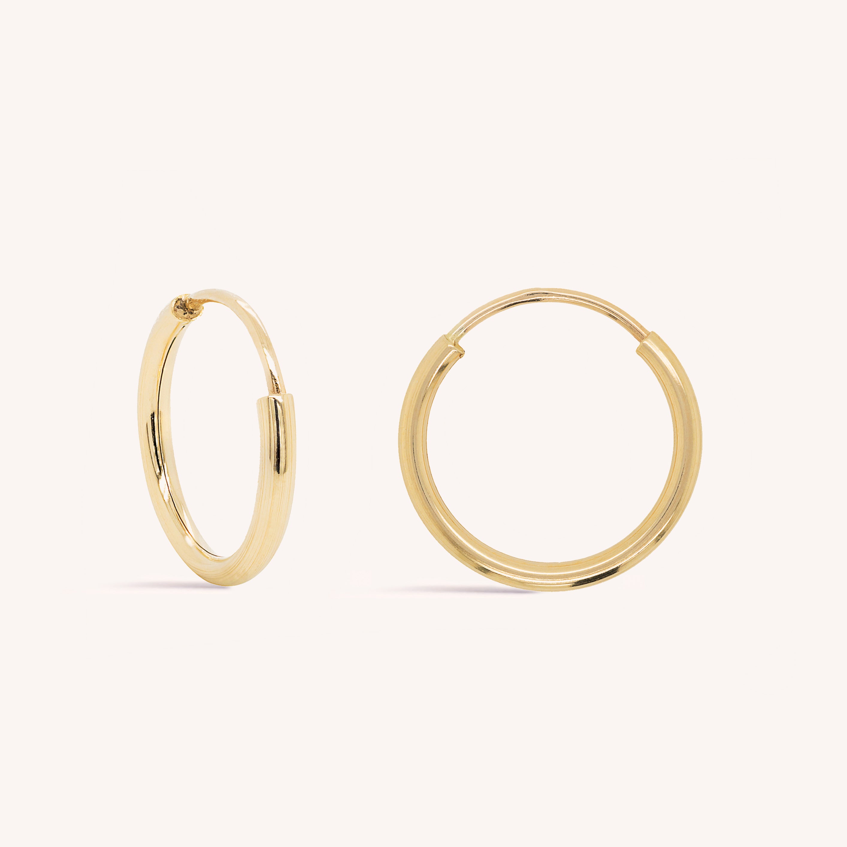 Offers 14k solid gold hooked on hoop earrings